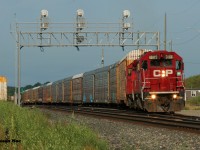 After a long night traversing the Windsor and Galt Subdivisions, CP 2-244 finally arrives at Wolverton with a pair of venerable GP38-2's leading the eastbound. Reportedly, the fresher London crew on 2-244 would take over a late running 141 once it arrived here within the hour.