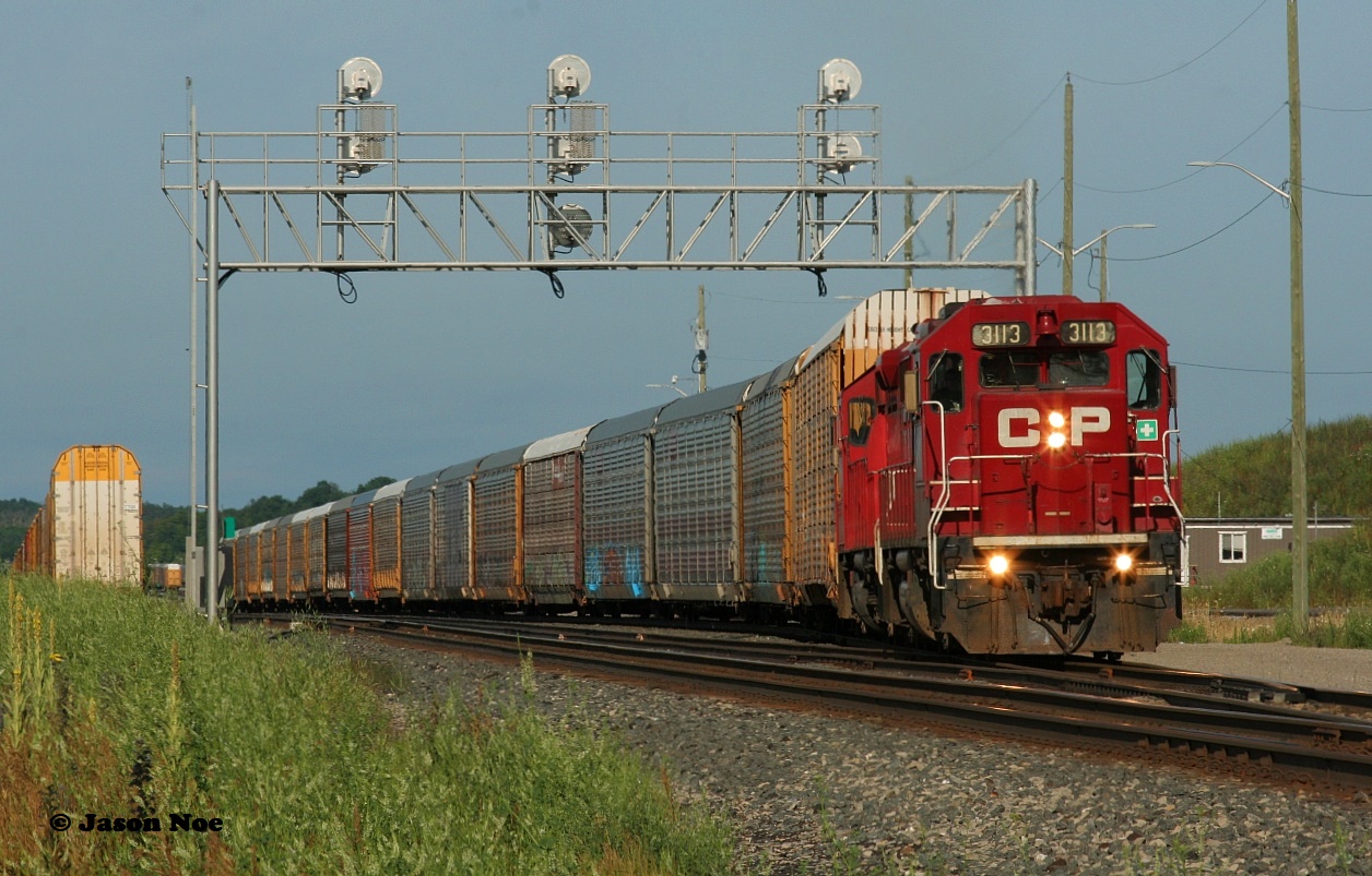 After a long night traversing the Windsor and Galt Subdivisions, CP 2-244 finally arrives at Wolverton with a pair of venerable GP38-2's leading the eastbound. Reportedly, the fresher London crew on 2-244 would take over a late running 141 once it arrived here within the hour.
