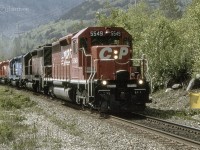 CP 5549 is headed east with the 5767, CR6322 and 5723 trailing at Ruby Creek on CPs Cascade Sub.