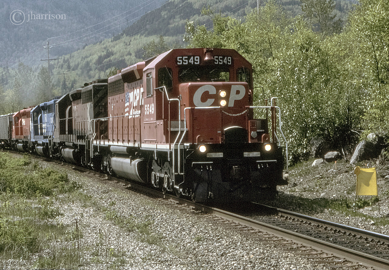 CP 5549 is headed east with the 5767, CR6322 and 5723 trailing at Ruby Creek on CPs Cascade Sub.