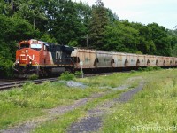 CN B731 races through Paris pulling a string of empty potash cars, destined for Saskatchewan. The locomotives were both CN ESS44ACs 2942 & Mid Train DPU 2859 (Not Pictured). 