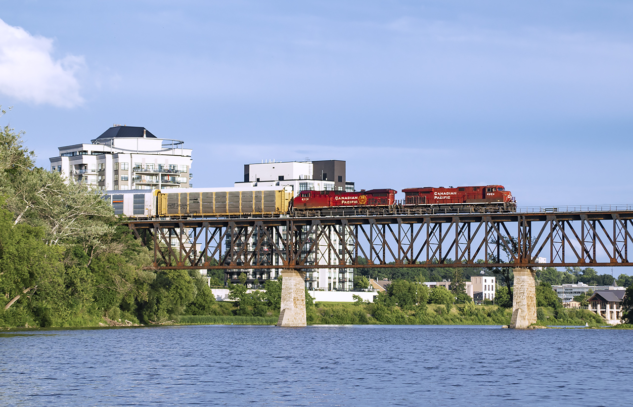 CP 147 soars above the Grand River at Galt.  The short train will make the climb up Orr's Lake Hill with ease.