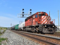 CP Rail 3WED-15 with CP SD40-2 6043 in the lead powers the vegetation control train through Milton, ON at Mile 31 of the CP Galt Sub on a sunny saturday morning.