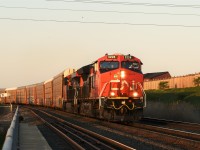 A somewhat form of "Foreign Power" on the Galt Subdivision after train 2-119 turned into 2-241 in Lambton with CN 3228 & CN 3209 to proceed westward towards Detroit with just shy of 10,000 feet of empty racks. 