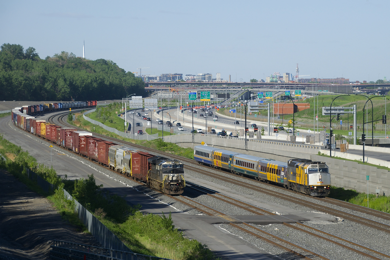 Wrapped VIA 6420 leads VIA 69 past parked CN 529 as it heads to its next stop at Dorval Station.
