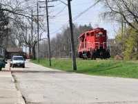 Trillium Railways New JLCX 3502 in its Red paint idles at Mile 5 of the PCHR Harbour Spur in Port Colborne as crews gather a large cut of Tankers from Macey Yard just down the line to bring to Feeder yard.