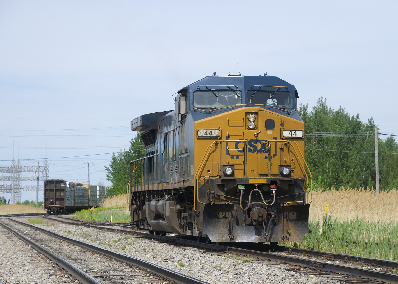 CSXT 44 (classified as a CW44AC by CSX) is laying over in Beauharnois on a hot spring afternoon.