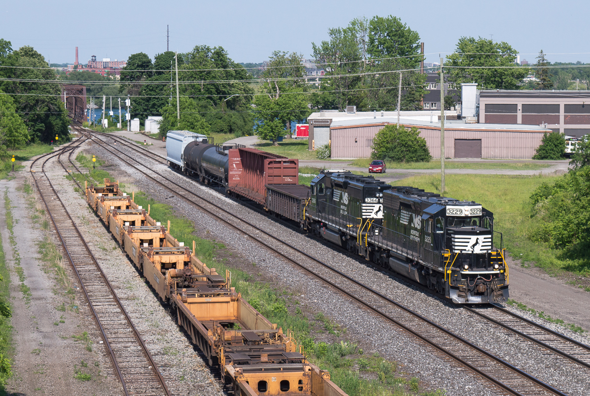 NS 3229 and NS 3366 bring a small 5 car C93 into Fort Erie on a warm June afternoon. NS 911 had been leading C93 each day of the week up until Friday...go figure it didn't run the day I go down but I won't complain about a pair of SD40-2!