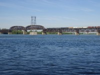 A pair of AC4400CW's (CP 9832 & CP 9803) lead CP 253 on CP's double-track bridge over the St. Lawrence River.