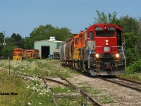 Goderich-Exeter Railway 581 pauses at Goderich, Ontario while the crew finishes their lunch, after lifting salt hoppers from the harbor. Shortly 581 would begin the trip back to Stratford on the Goderich Subdivision with RLK GP40 4095 leading the short train. 
<br>
Less than a year later, this former CN unit has since been repaired and returned to service following extensive repairs to damage it had received in a runaway derailment in Goderich during February 2021. 

