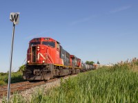 Cn 438 rolled down the Cn Pelton Spur, again giving the crew a natural cooling session with the cab door open. 