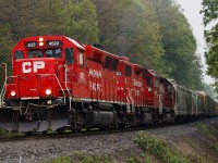 CP T72 heads west with 4522 leading the way. The trio sure sounded awesome crawling up Orr's Lake. 
