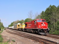 After a lengthy delay at Hornby with power issues, CP sent the power from CP 244 to rescue the train. The sparkling new CP 8204 (former CP 8517) took over the lead and with EMDX 7205 made their way westward. I never heard anything about the EMDX, so it came as quite the surprise. With a clearance straight through to London, they pass through Guelph Junction with a pair of gentleman headed to the quarry for an evening swim.