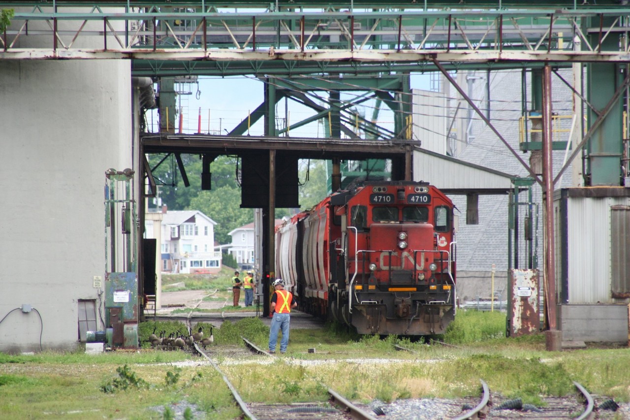 A CN industrial job is deep inside the Cargill grain terminal delivering loads of potash fertilizer.