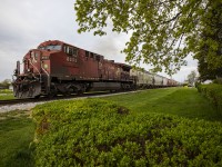 This train came into Windsor the previous night as CP 340, but for the hand-off to ETR the CP yard crew used the ID T-42. Whenever CP brings a grain train for ETR they cut the rear DPU(s) off at Dougall, pull up through the crossover between CP and ETR, and once clear of the crossover an ETR crew backs on while the CP crew detaches from the head end. ETR then brings the train to ADM in Ojibway. It's a really cool operation to watch and listen to on the scanner. This usually occurs a handful of times every year.  