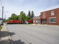 The OSR Woodstock job heads east through the town of Beachville, ON. A bit of a throwback scene to when CP ran GP9s on this line before leasing it to OSR. 