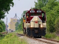 Such a lush and vibrant time of year. Fresh spring colour can really make photos pop. OSR's Woodstock job is seen heading back to the siding at Cami after moving around a cut of hoppers left earlier in the morning at the potash facility in Putnum seen in the distance by the St. Thomas job on their way to St. Thomas. I am missing the common sight of OSR's MLW units but at the same time I really can't complain about chop nose veteran GP9's. 