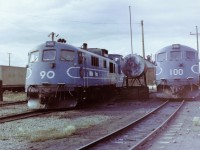 An evening shot of WP&Y 90 & 100 resting outside the locomotive shed at Whitehorse YT. If I remember correctly I had just arrived at Whitehorse for a work related two week stay. I enjoyed the people, the scenery, and the history. You can read about the gold rush era and learn a lot, but to actually stand there and see the remains of what the gold rush era did for the Yukon is amazing. Looking it from a railway point of view I thought of the original need for the WP&Y and for its service during WW2 so I made it my goal to get as many pictures as I could. At the time I did not realize that I was seeing the WP&Y in it's last days before it shut down just a few month's latter. As a side note the area around the locomotive shed has it's own micro history.