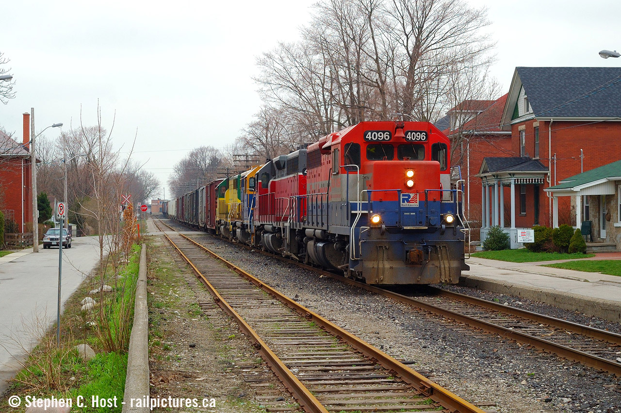 With a departure from Kitchener after meeting 85, eastbound 432 was best photographed on a cloudy day around Guelph. So here's one of my many offerings along Kent St, this one posted to contrast this recently posted CN view of mine of the 'new' CN era. The four axle era on GEXR sure was sweet.I wonder what this will  look like once Metrolinx puts back the siding that was removed.. which I'm told is coming soon.. very soon. (I'll believe it when it happens).
See the house for sale? I bet that sold in 2006 for about $250k.... dreams now.