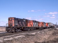 CN 3118, 4230, 4505, and 4520 are on the head of CN train #251 in Malton, Ontario on April 2, 1986.