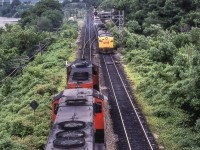 Eastbound VIA 6530 meets a CN freight at Bayview Junction, Ontario in July 1980.