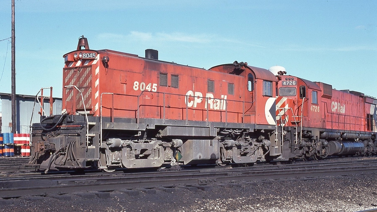 An 'ugly 80' , MLW 1959 built RS-23 #8045 is powered by a six cylinder ALCO designed intercooled turbocharged 251C engine.


   And geared for 75 m.p.h.  (  !  !  )
 

   By 1997, CP Rail 8045 to the Windsor and Hantsport Railway, the latter operated a final gypsum train autumn 2011.


   at  CP Rail Agincourt, January 20, 1980 Kodachrome by S Danko.