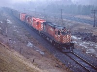 <br>
<br>
  ...the last C-424
<br>
<br>
   CP Rail #4250, MLW 1966 built, leads two MLW 1958 & 1957 built RS-18's ,  #8770 and #874?, eastbound at Spicer...
<br>
<br>
   on a dark, damp, foggy and cold and generally miserable April morning...normally one would not bother to try K64 photography...slow film, slow shutter speed, wide open aperture...
<br>
<br>
   ...it is a special day: awaiting the westbound Discover British Columbia Tour train
<br>
<br>
   at mile 131 Belleville Subdivison, April 11, 1978 Kodachrome by S.Danko
<br>
<br>
   The day was worthwhile:
<br>
<br>
     <a href="http://www.railpictures.ca/?attachment_id=  7412">   nice catch  </a>
<br>
<br>
   