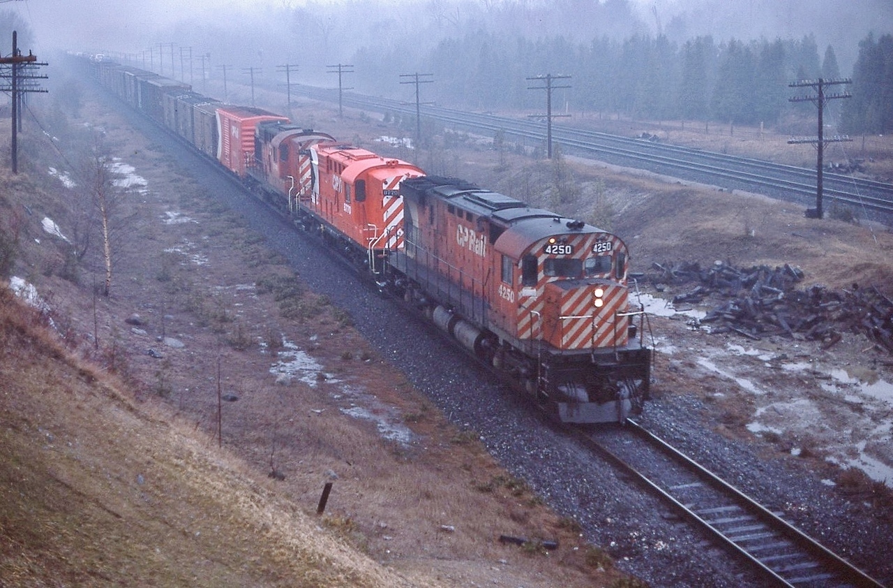 ...the last C-424


   CP Rail #4250, MLW 1966 built, leads two MLW 1958 & 1957 built RS-18's ,  #8770 and #874?, eastbound at Spicer...


   on a dark, damp, foggy and cold and generally miserable April morning...normally one would not bother to try K64 photography...slow film, slow shutter speed, wide open aperture...


   ...it is a special day: awaiting the westbound Discover British Columbia Tour train


   at mile 131 Belleville Subdivison, April 11, 1978 Kodachrome by S.Danko


   The day was worthwhile:


        nice catch