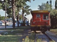 <br>
<br>
   During late summer a road map is not needed to find Leamington...
<br>
<br>
   ...simply follow the trail of tomatoes that fall from the farm wagons...
<br>
<br>
   Arriving at the 1887 built Canada Southern station the ' Leamington Flyer ' slides into the siding at stately 5 m.p.h., September 17, 1986 Kodachrome by S.Danko 
<br>
<br>