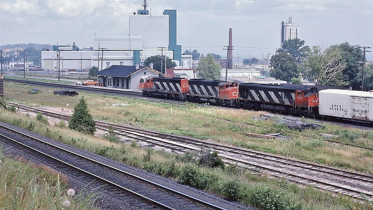 Certainly impossible to shoot this angle today


   Eastbound merchandise powered by  GMD 1974 built GP40-2L(W), CN 9411 & sister 9413  and BBD 1982 built HR616  #2106  with a Southern Pacific Fruit Express 459895  load & many others,


   At the recently restored ( circa 1985) ex GTR 1856 built station, July 20, 1986 Kodachrome by S.Danko


   Note the occupied and since long removed interchange trackage.