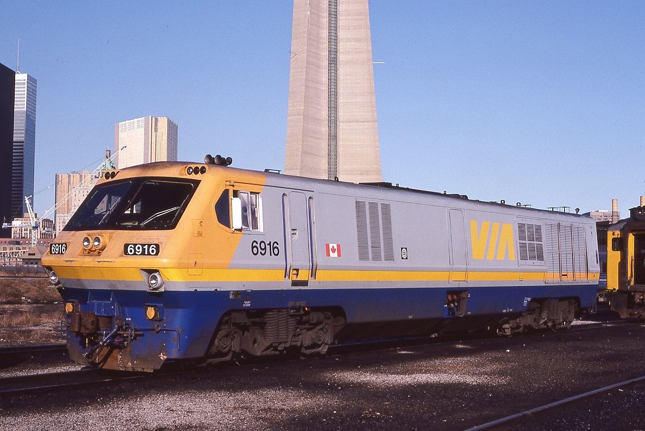 Of twenty one Class MPA-27a, BBD 1980-82 built LRC-2 #6916 is one of seven that survived in service to 1991.  


   At CN Spadina,  March 13, 1983 Kodachrome by S.Danko  


   notable: With the 1986-1989 delivery of fifty nine GMD F40PH-2  locomotives,  9 of 10 LRC-3's and 14 LRC-2's were promptly placed in storage.


   in the left distance, is the top floor and roof of the TTR John Street Tower, the Tower exists today shorn of the roof  to accommodate the subsequently constructed Metro Toronto Convention Centre bridge / walkway.


  sdfourty
