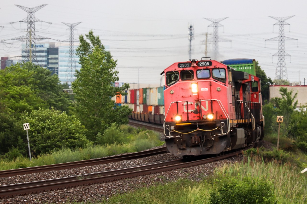 CN Z149 rounds the bend at mile 15 of the York sub with a pair of veteran Canadian Cab Dash 9s. Built in 1994, the C44-9WL was installed with CNs unique "Canadian Comfort Cab"; a design that made engines both safer and more comfortable. 23 were made for CN and 4 were made for BC Rail. Seeing a pair of Canadian Cab Dash 9s has always been pretty uncommon, let alone in 2021 while CN has dozens of locomotives in storage.