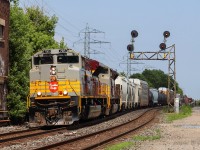 CP 421 picks up speed through Bartlett after slowing down around Mile 3 of the North Toronto sub with a pretty fantastic duo. CP 7015 and CP 7010 (both EMD SD70ACU) pull over 100 cars westbound. CP 7015 and CP 7010 were the first two units that CP presented publicly after announcing their project of painting some SD70ACUs in heritage colours. While both units are in Maroon & Gold, CP 7015 wears the "Block" variation while CP 7010 displays the "Script" variation. 