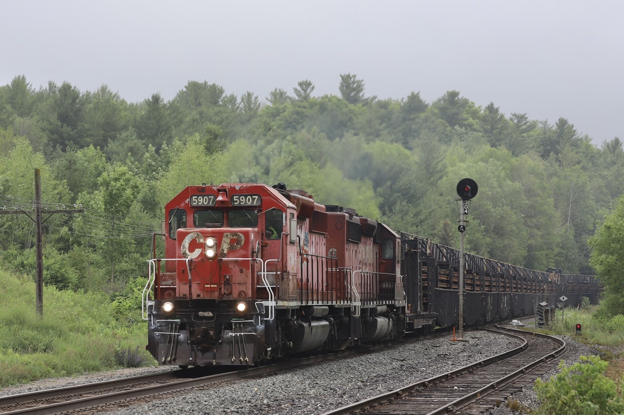 2021.07.09
CP 5907 leading 2CWR-08 Continuous Welded Rail train, CP 5936 trailing 
at South Siding Switch Palgrave (Mile 30 Mactier Sub)