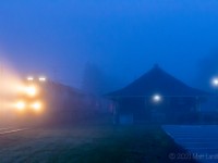 In some killer early morning fog, potash train 730 heads through the town of Hampton, New Brunswick, with a pair of ex CREX ponies at the head end. 