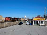 With a friendly wave from conductor Laura, CN A439 rolls through the Town of Tecumseh passing one of many famous pizza shops around Windsor-Essex. Founded in 1984 Naples  is a go to for myself when it comes to ordering pizza. With Windsor-Essex being known for its pizza you really have to be good to succeed around here. 