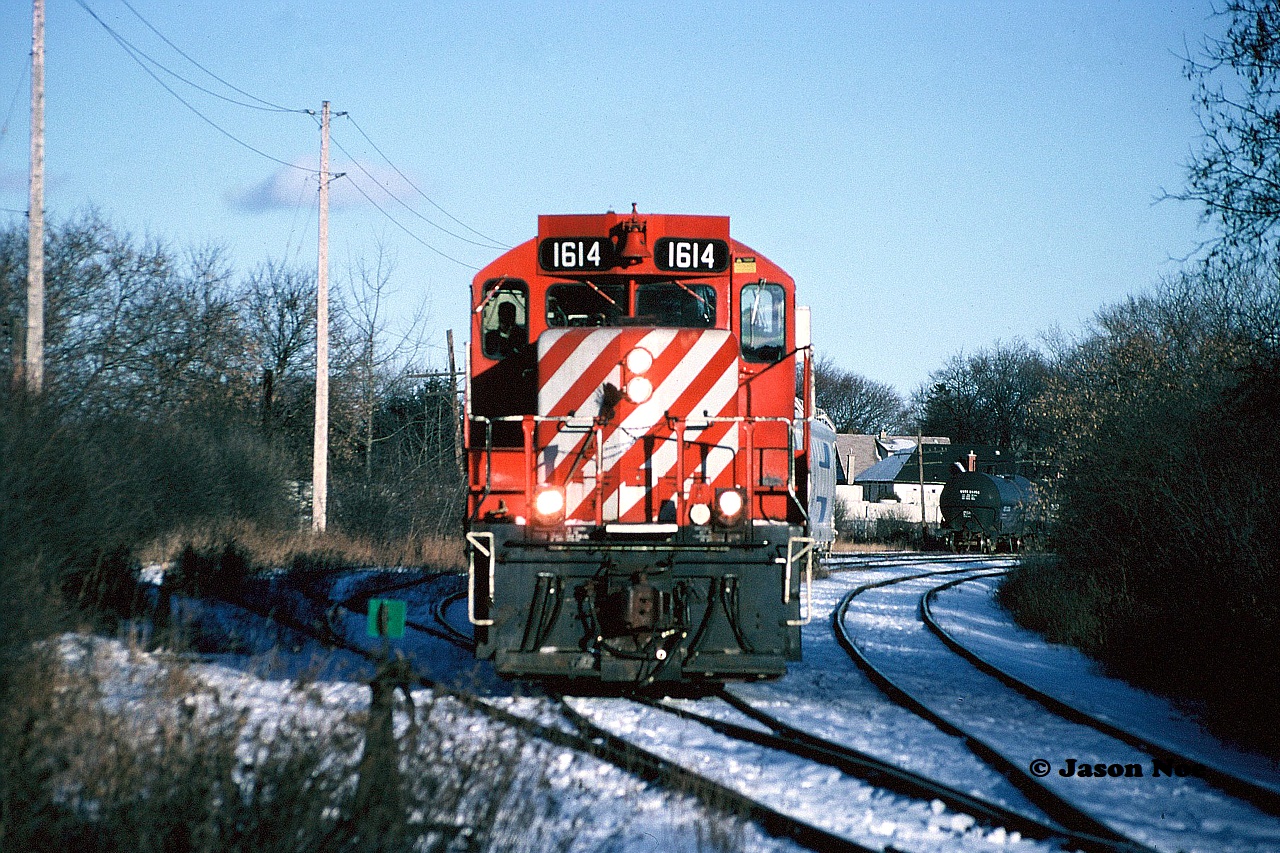 Back in mid-90's, there was only one yard in Guelph that CP had utilized regularly and that was at Stevenson Street. Here, GP9u 1614 powers the final CP train to operate to Guelph on the Goderich Subdivision as it lifts cars in the small "lower yard." As the clock would strike 1998 the following day, operations on the Guelph Junction Railway (GJR), would be taken over by the Ontario Southland Railway (OSR), which 0perated this trackage for the following two decades.