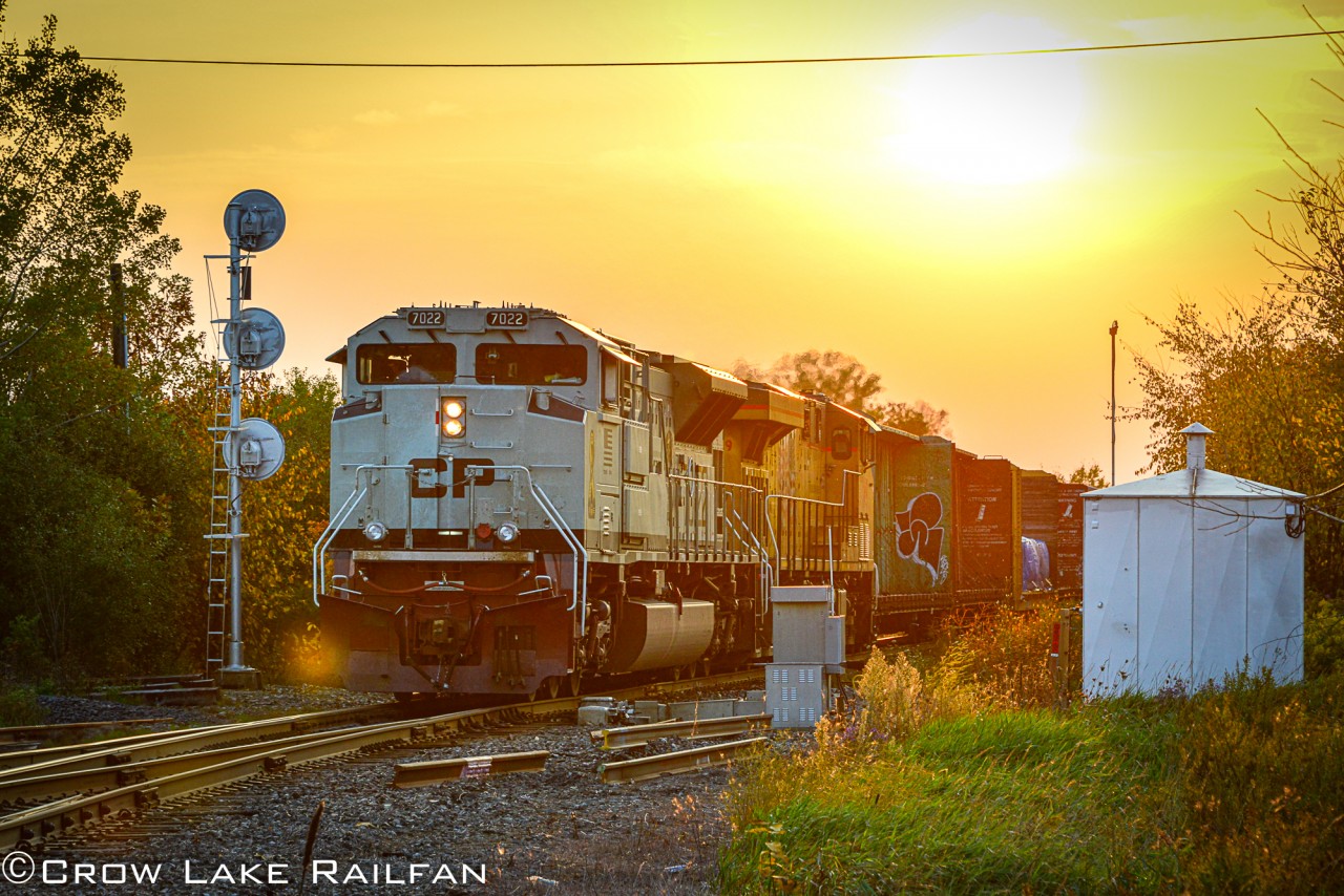 With smoke in the air from forest fires out west, CP 118 cruises past the Elmsley siding just minutes away from a crew change in Smiths Falls, Ont.