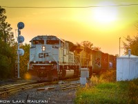 With smoke in the air from forest fires out west, CP 118 cruises past the Elmsley siding just minutes away from a crew change in Smiths Falls, Ont.
