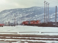 I know that there are two or three of you out there that have never been to Trail BC but if you take the opportunity to do so you will be impressed by the size of the mining and related processing plants located there! The industrial area sits at a slightly higher elevation that the town and it is the only area served by the CPR. The attached photograph was taken from the edge of the old highway leading into Trail. I never trespassed there because I did not think it was wise. Especially at that location.  I was quite happy to catch the two CP first generation locomotives #'s 8616 & 8820 working together near the entrance to the site. 