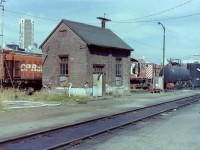 The exact date I can't remember but I know it was on a Sunday. My friend Jack Lord & I had been discussing this trip for weeks so I picked him up and we drove all the way from New Westminster to downtown Vancouver so we could photograph what was left of the CP "Drake ST. Yards" There was no railway activity taking place but the place was crawling with people walking around and on bikes. There were lots of buildings to photograph along with a few MLW yard engines. At no time did I see any graffiti on anything. The attached photograph was taken near the ready tracks which was located just north of the roundhouse.  The brick building (oil house) was a leftover from the steam era and the two tanks (lube oil tank & waste oil tank) were a much latter addition. On the other side of the oil house sat MlW units 7094,7116,7117, & 7113 and behind me sat MLW 7076. All the locomotives on site were shut down.