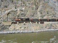 Unlike today, the air was fresh and crystal clear as westbound CN 2800, with a loaded coal train, traveled along the Thompson River near, or at Morris, on CNs Ashcroft Sub. The location is about halfway between Lytton and Spences Bridge, and just across the river from CPs mile 84.71 Nicomen Overpass.  