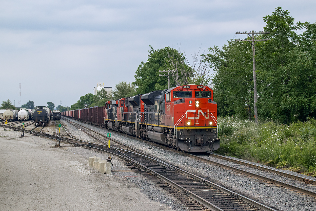 After a long, slow trip dumping ballast from Georgetown to Guelph, W933 arrives at Kitchener and the end of its westbound journey.  The crew will put the train in the siding and run the power to the east end waiting for VIA 87 to clear before returning to Mac Yard.Came across Steve Host a few times on this chase, his shot can be seen here.