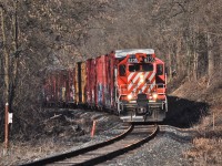 OSR 8235 puts on its best CP Rail 8235 impression as it just enters Ingersoll Ontario. It's always nice getting a break in the rather gloomy, overcast days of solid stratus clouds Ontario gets in the early spring. 