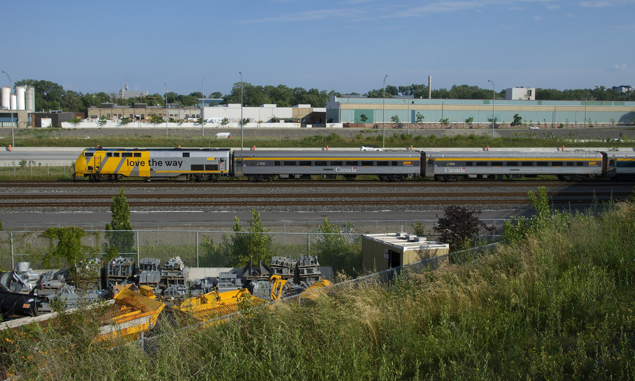 VIA 28 has a pair of refurbished business class cars up front as it heads towards Central Station. VIA's stainless steel cars such as these had been completely absent from the Quebec City-Windsor corridor for over a year; with an increase in service frequency a few weeks back they have made a comeback.