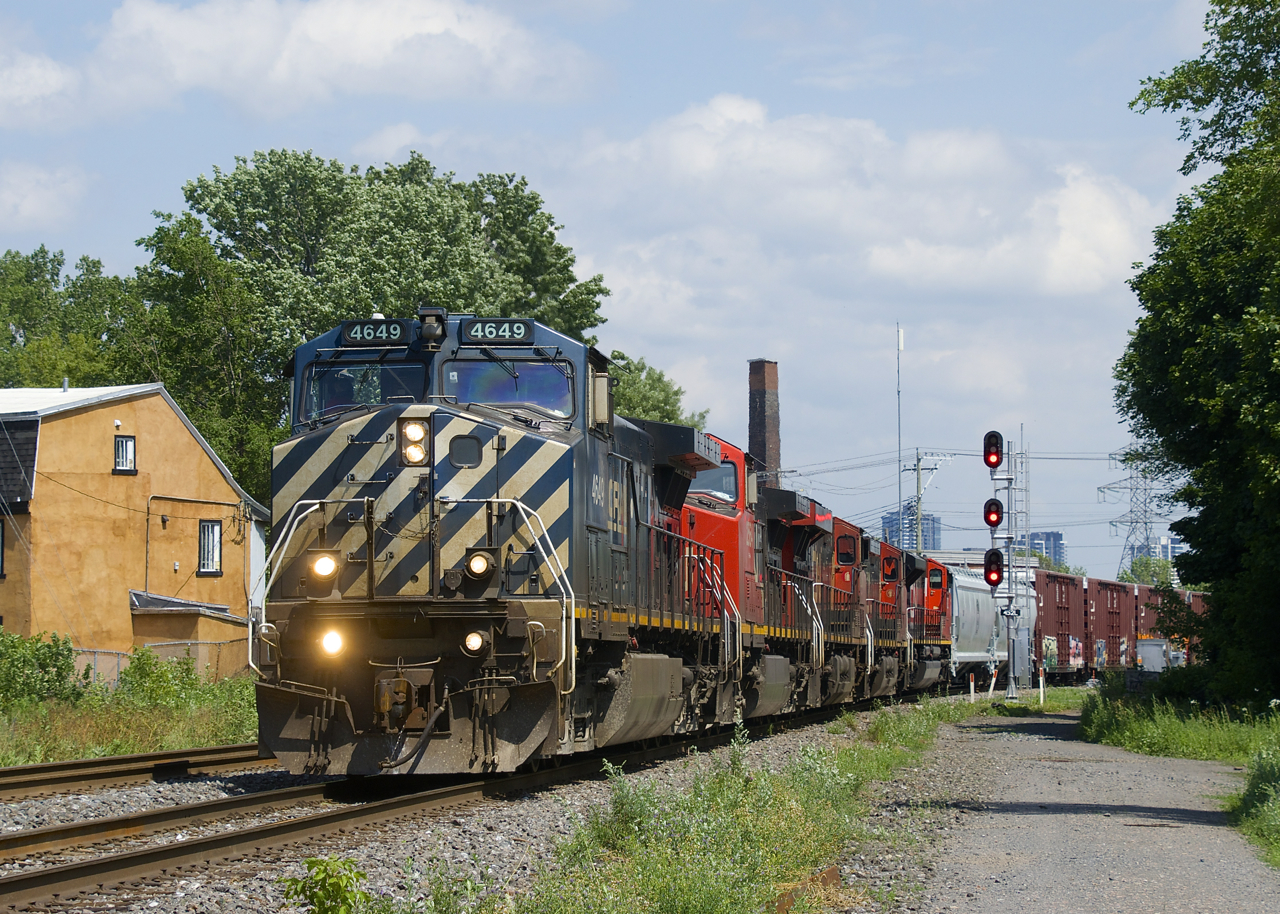 CN 527 has five units as it backs up towards Pointe St-Charles yard with a BC Rail leader.