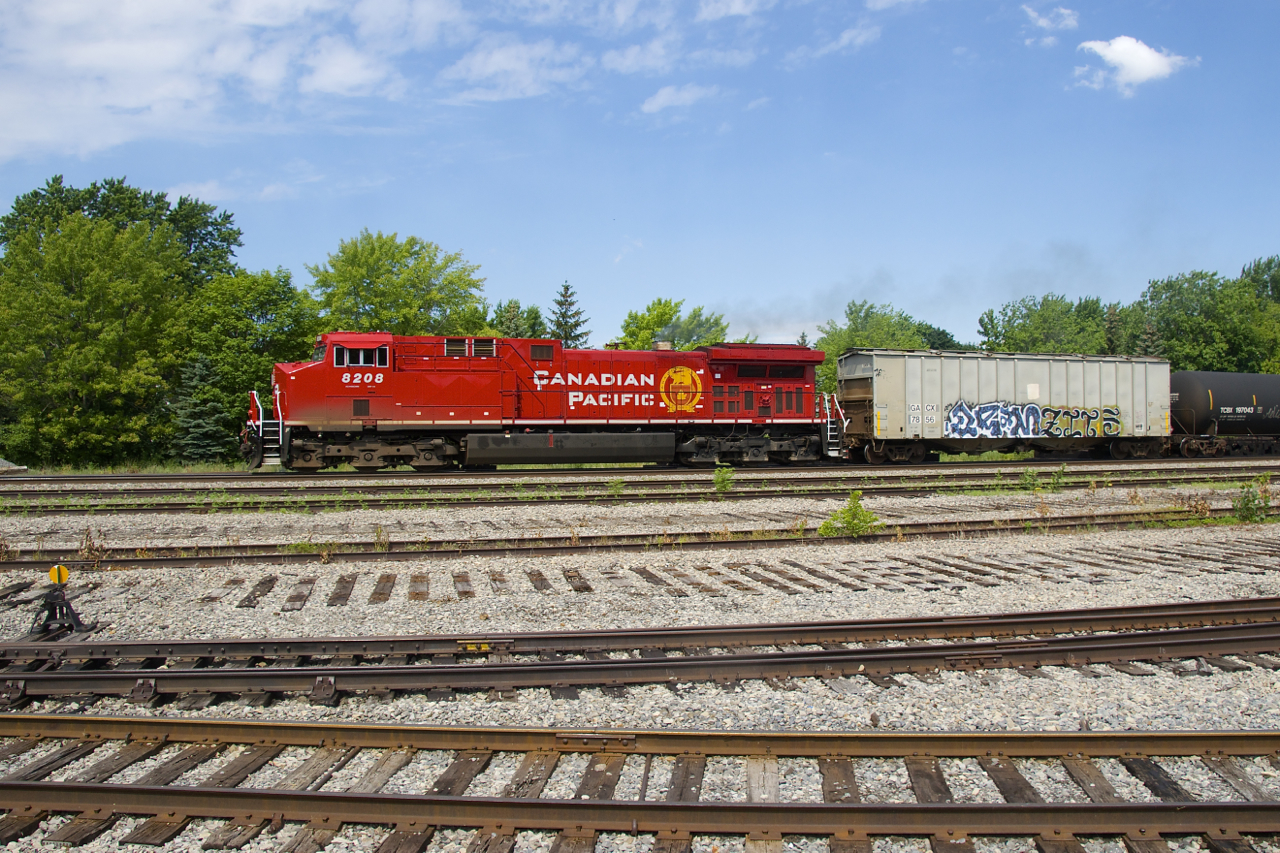 CP 8208 (ex-CP 8560) leads CP 650 past the Lasalle Yard, which was partly torn up recently. The track at the bottom is still in use and leads to the Lasalle Loop Spur, which still has two active clients.