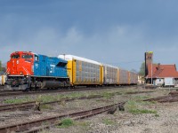 CN E271 is lead through Brantford under threatening skies by the GTW heritage unit.  This was my second frame of the train, the first being with my drone which can be found <a href="http://www.railpictures.ca/?attachment_id=45487">here</a>.