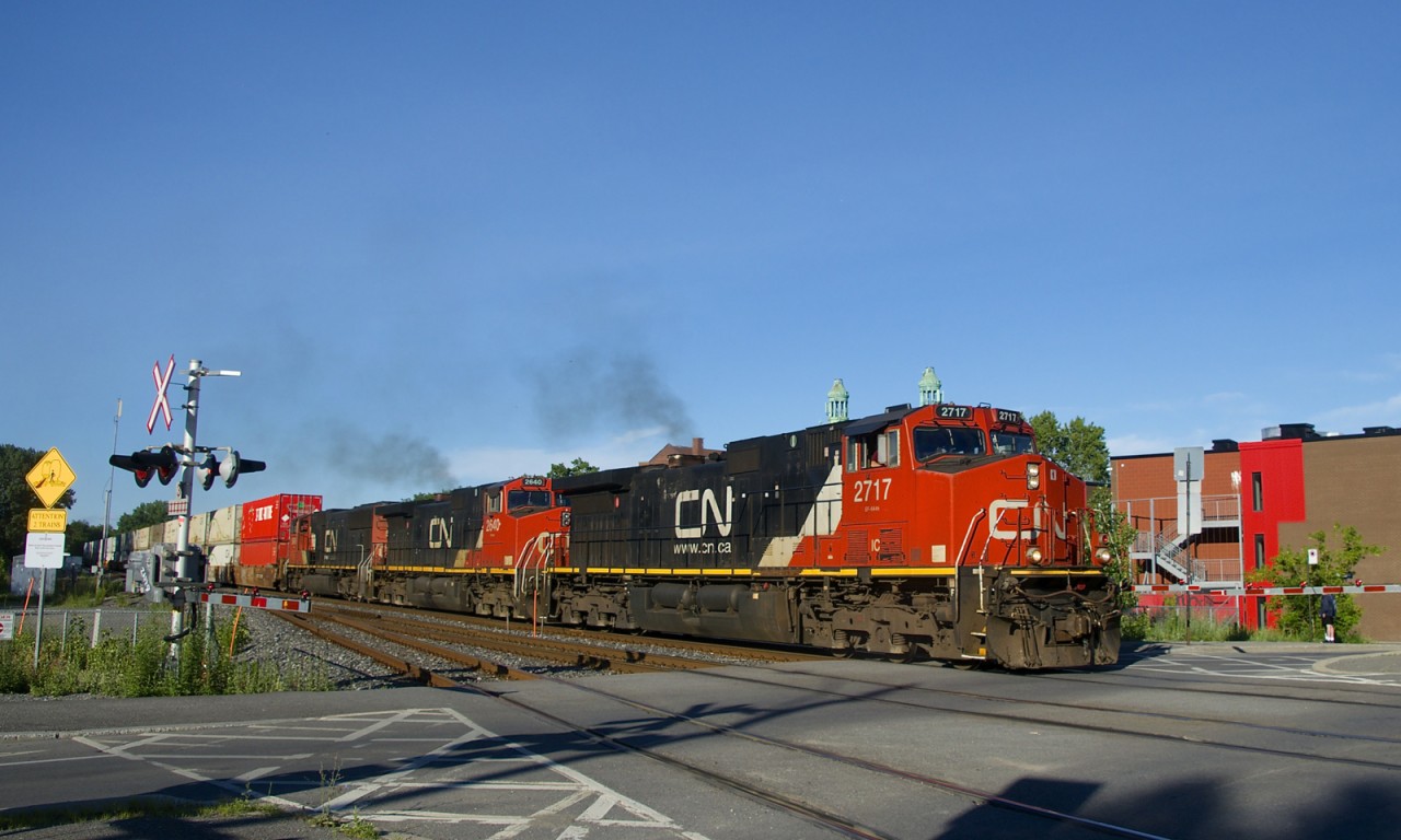 The GE's let out some smoke as a 612-axle long CN 120 crosses Courcelle Street with IC 2717, CN 2640 & CN 5649 up front and CN 2318 mid-train.