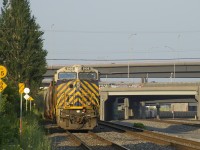 Potash train CN B730 is crewless and parked on the south track of the Montreal Sub after arriving there overnight. Leading is CN 3926, still in Citirail paint (it was originally CREX 1424). Out of sight behind it is another ex-CREX unit, CN 3924 (originally CREX 1421). CN has recently put a number of these units into service before being repainted.